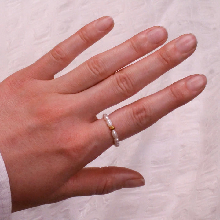 Reis Perlen Ring mit vergoldeter Perle